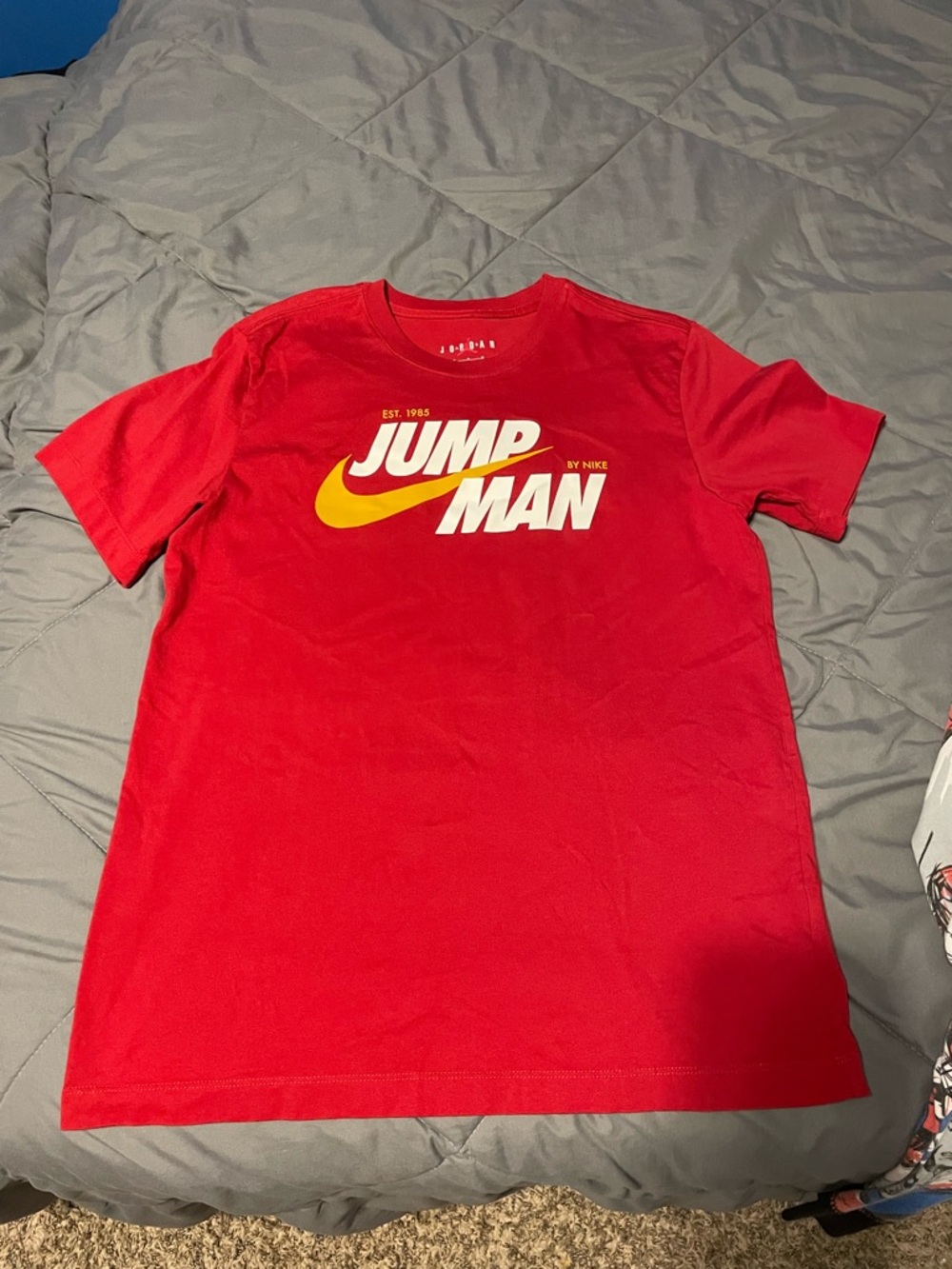 Jordan Red Short-Sleeve Jumpman Logo Tee with Yellow Swoosh